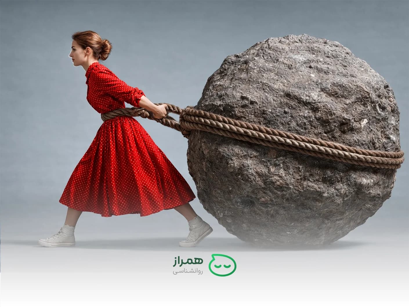 A woman pulling a heavy rock tied with a rope, symbolizing emotional burden, responsibility, and psychological pressure