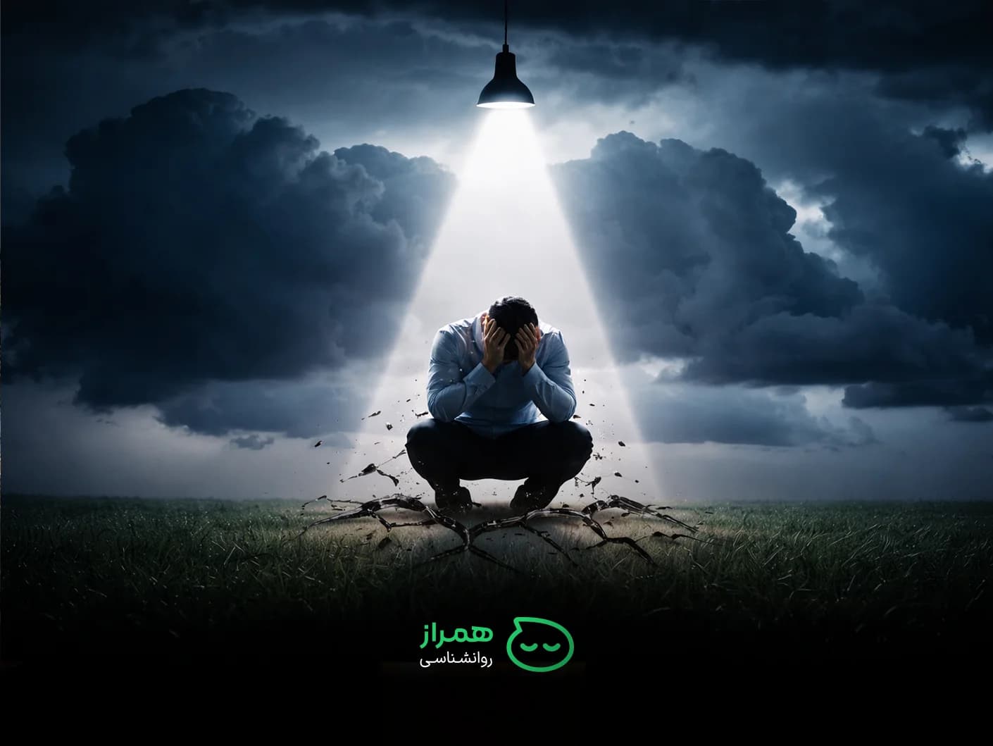 A man sitting alone under a spotlight with his head in his hands, symbolizing emotional collapse, stress, and psychological distress